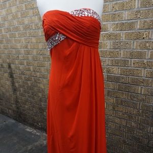 Red strapless evening gown